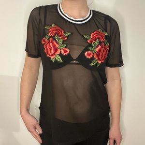Black mesh shirt with floral appliqué